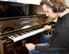 Pianist ist playing the Yamaha U1 TA2 TransAcoustic Piano