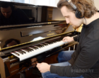 Pianist ist playing the Yamaha U1 TA3 TransAcoustic Piano